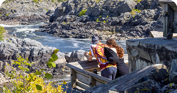 Couple taking in a beautiful river view